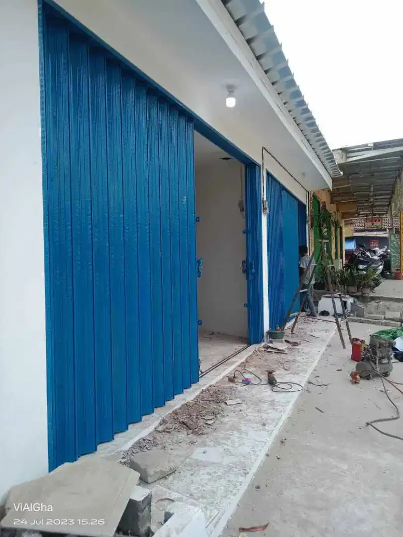 Tukang spesialis service rolling door dan folding gate