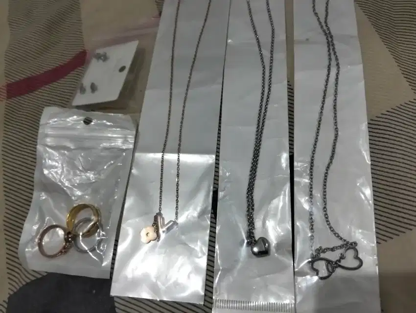 Kalung titan asli