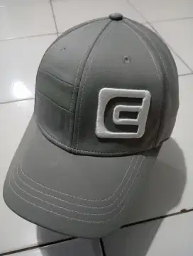 topi Rockwell golf abu muda mulus