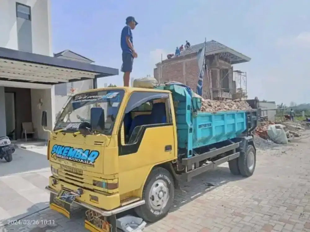 Urugan meterial puing , tanah merah super