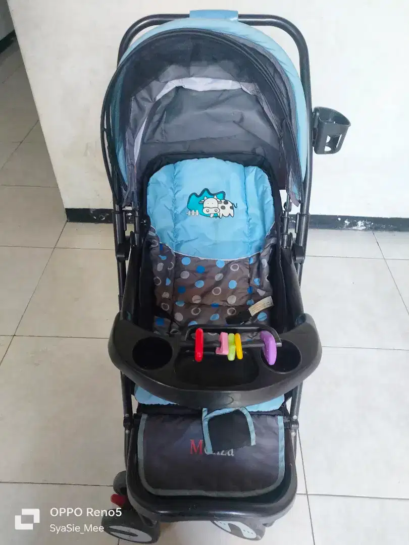 Stroller minus kain belakang robek