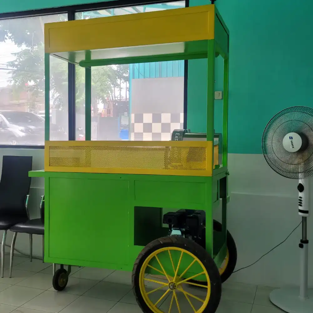 RODA DAN MESIN JUALAN AIR TEBU