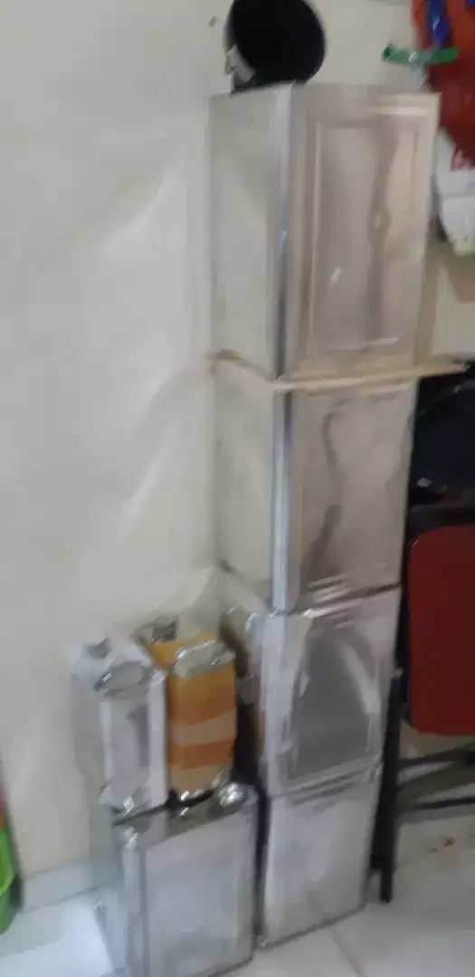 Derign kaleng multi fungsi bekas lem