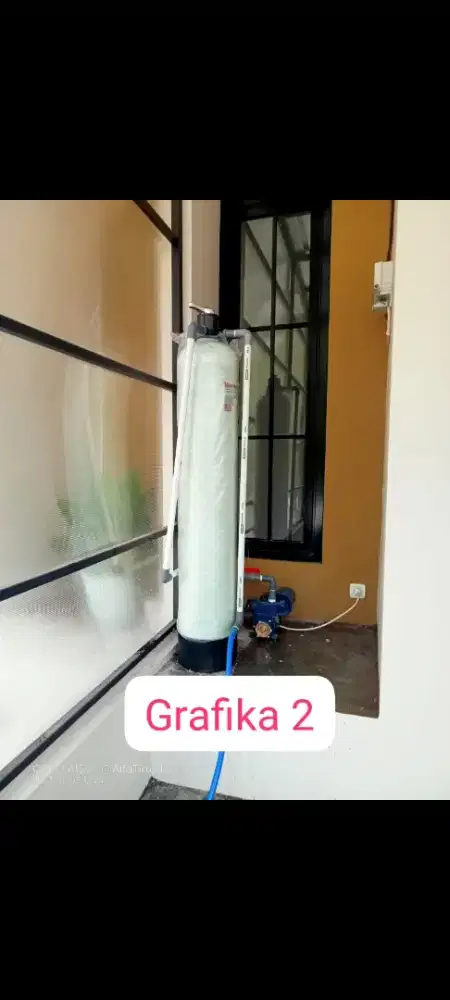 Pemasangan filter air dan instalasi pipa dan tandon air