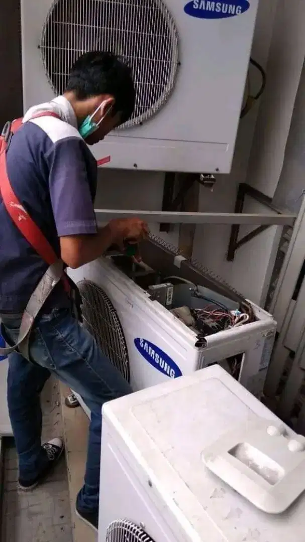 Jasa servis ac kulkas frezer showcase mesin cuci dan bongkar pasang ac