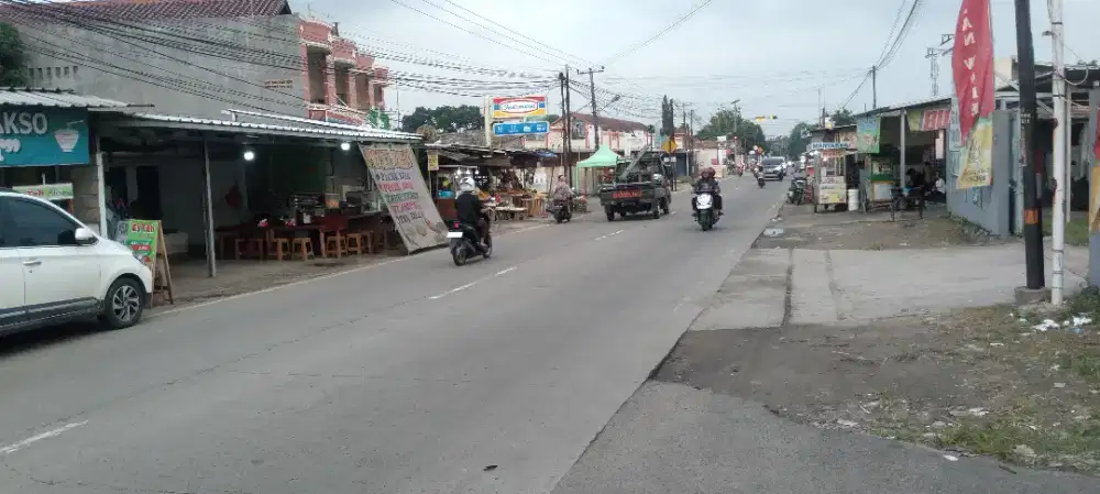 TANAH & BANGUNAN DI PINGGIR JALAN TAKTAKAN