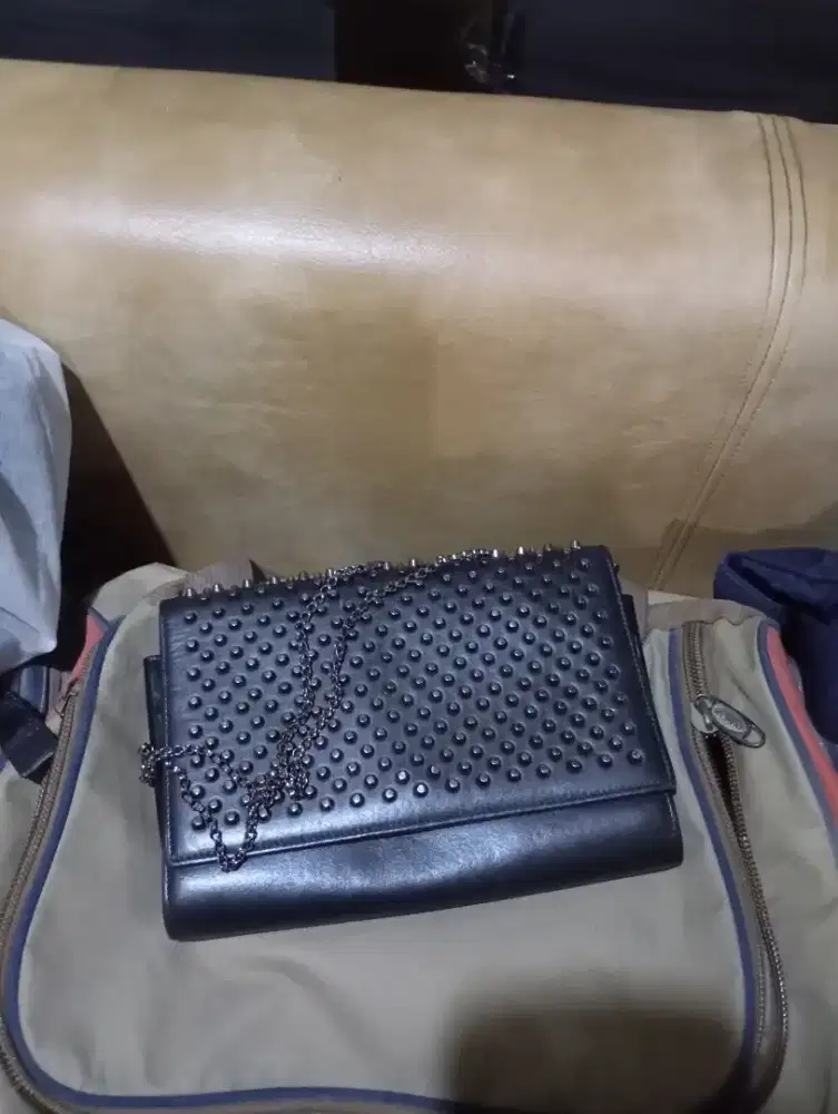 Tas cristian lubotin asli kulit