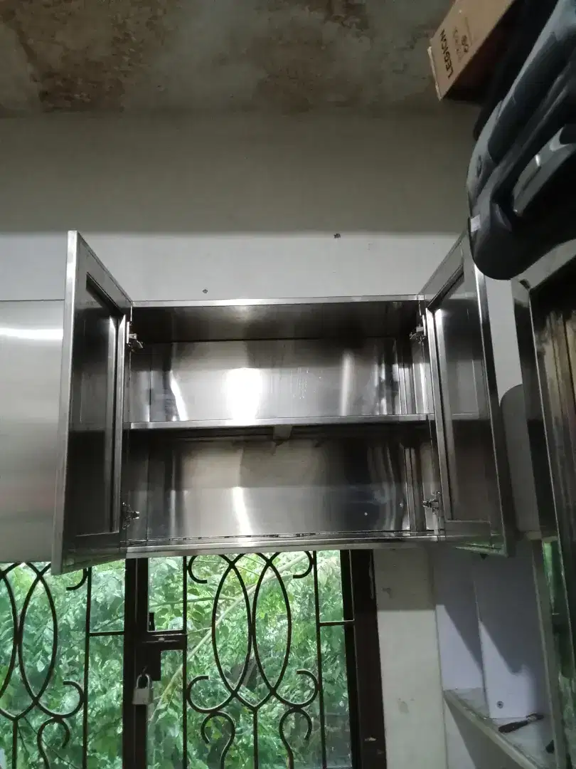 Jasa las stainless dan service pagar pintu lemari stainless