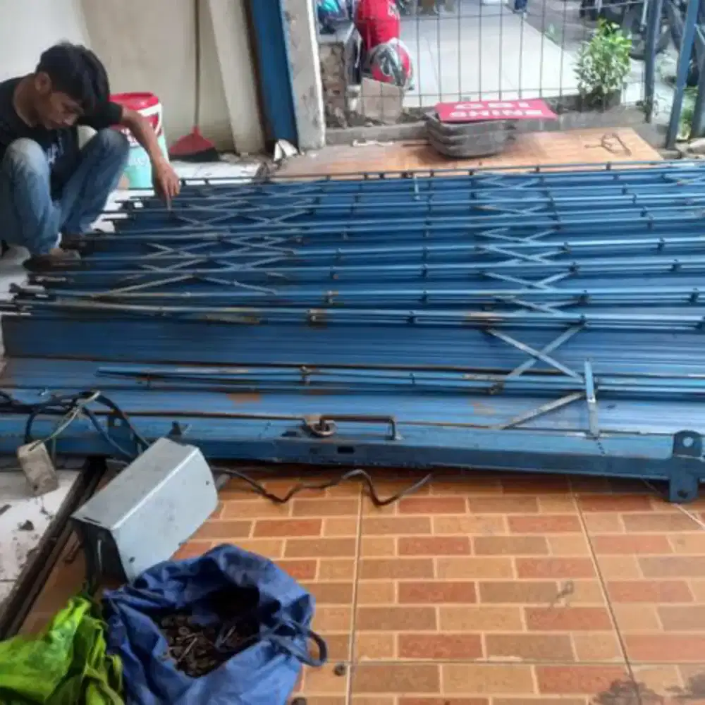 tukang spesialis rolling door folding gate