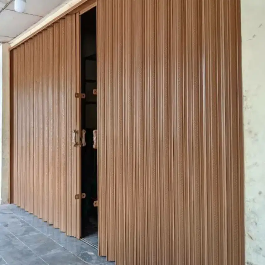 tukang rolling door folding gate
