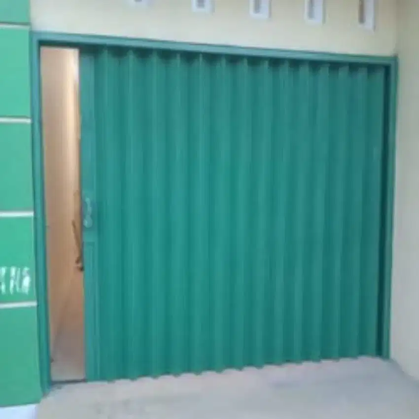 Folding gate rolling door