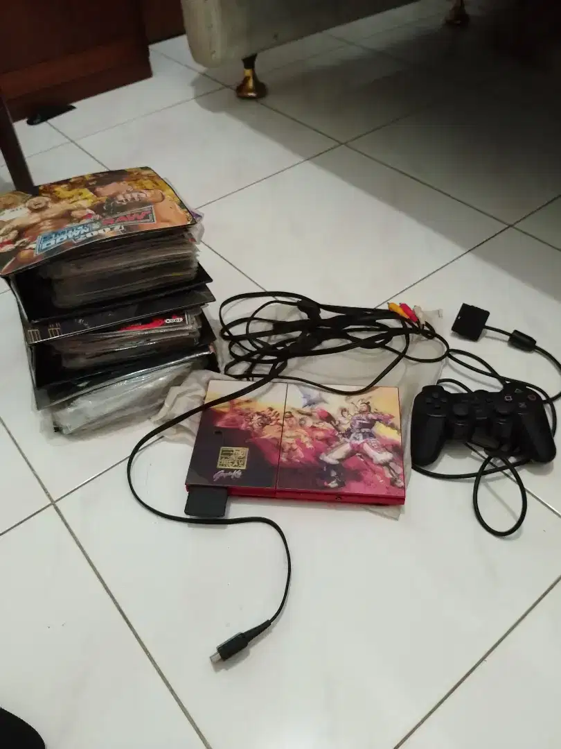 Playstation 2 slim + stik + semua game