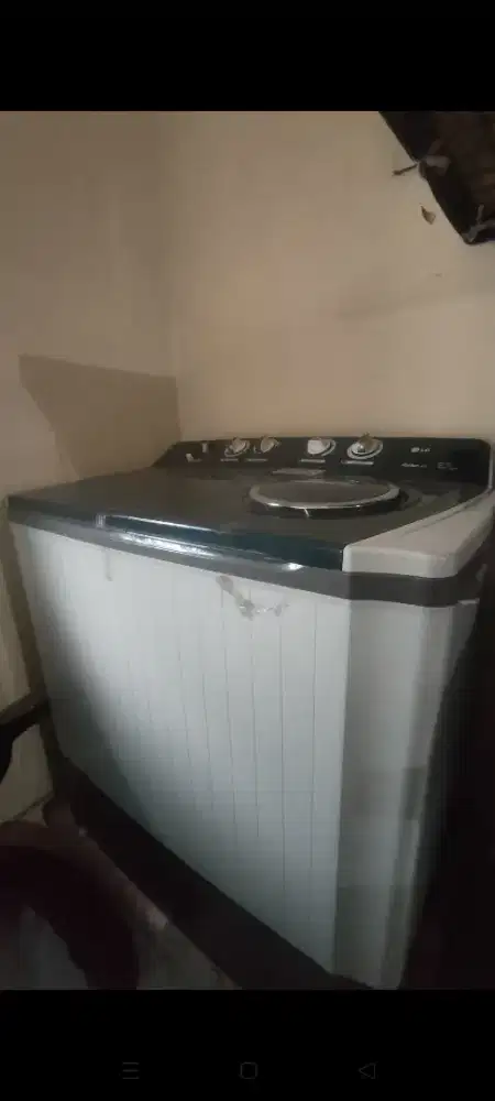 Mesin cuci top loading merk LG 14 kg