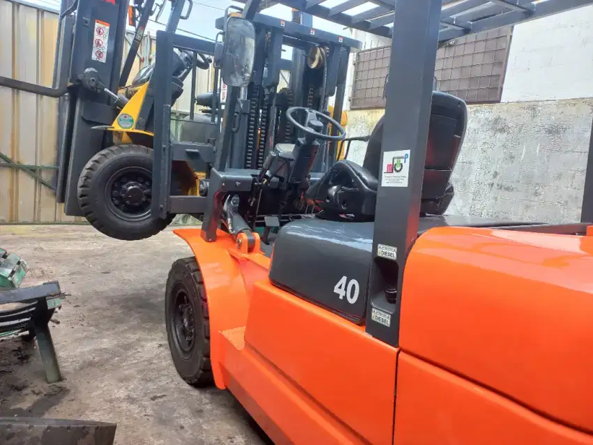 Forklift diesel 4 ton trilift istimewa