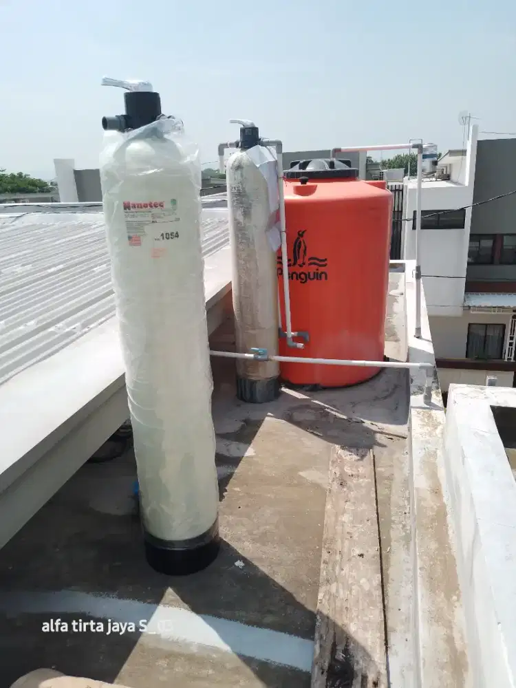 Pemasangan filter air dan instalasi pipa