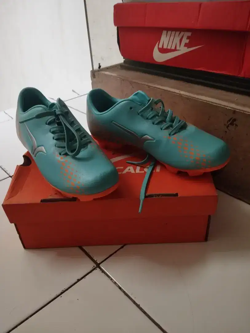 sepatu bola calci