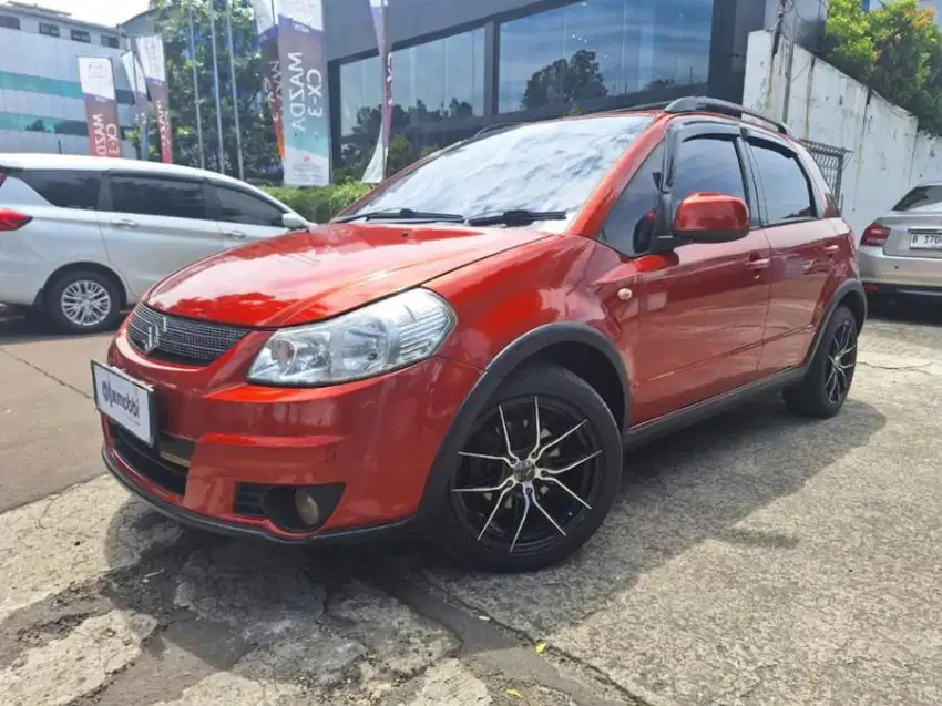 TDP 8JT Suzuki SX4 1.5 X-Over Bensin-AT 2009 Orange