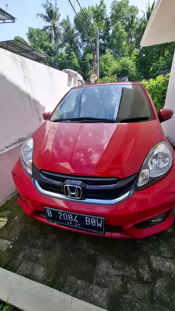 Brio E manual warna merah