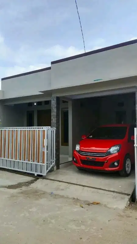 rumah minimalis bangunan baru depan kampus Unpam dan kawasan pabrik