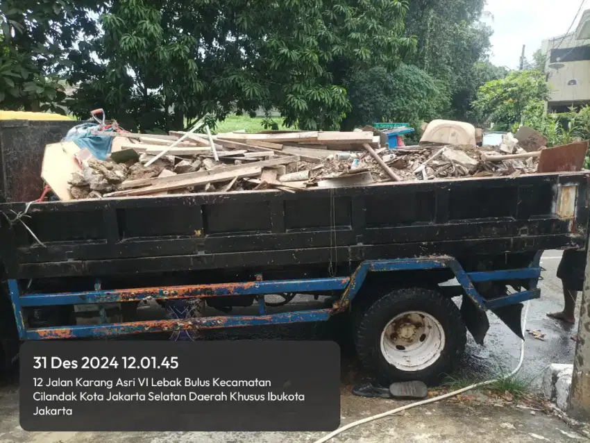 Jasa buang puing angkut tanah