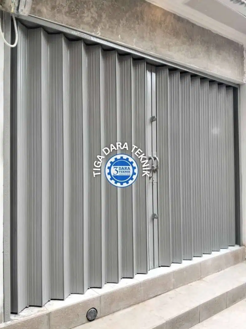 Gerbang lipat folding gate, pintu toko / ruko |  Tigadara teknik