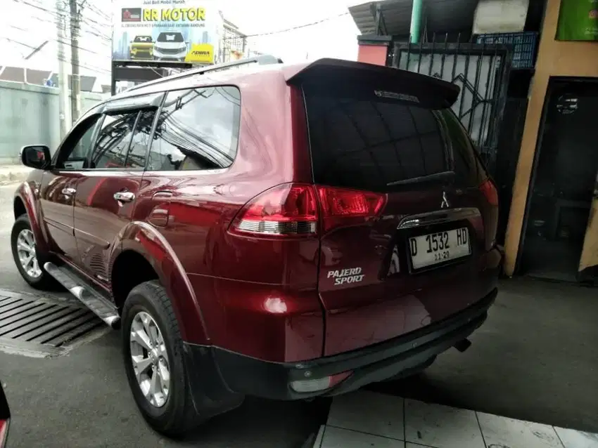 Mitsubishi Pajero Sport Dakar 2.5 VGT At 2015 Dp 25 jt Maroon Red