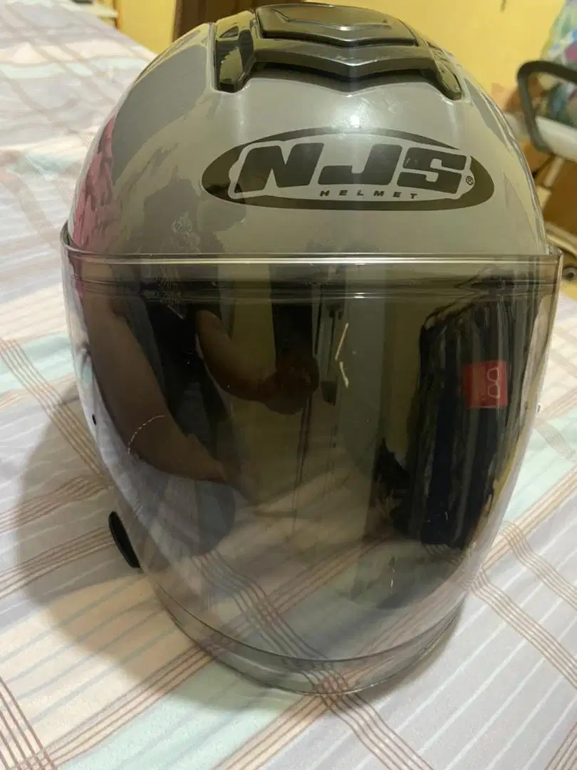 HELM NJS ABU TUA