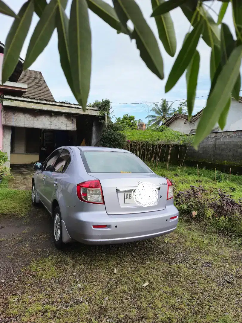 Neo Baleno Terawat Istimewa Low KM Tahun 2009