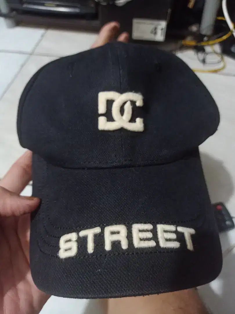 Topi DC hitam murce