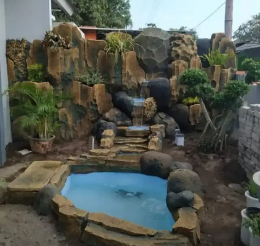 Tukang kolam koi relief tebing..