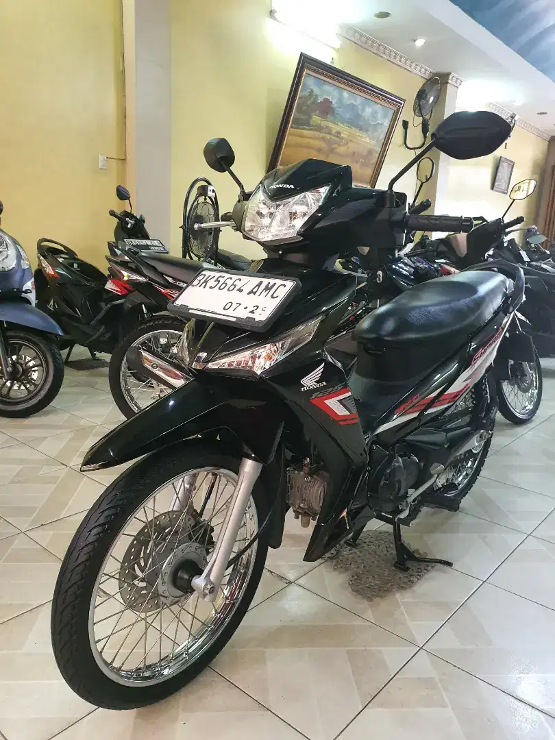 New Supra X 125 F1 SW 2024 Berkualitas-Odomtr 6.000 KM-plaza motor