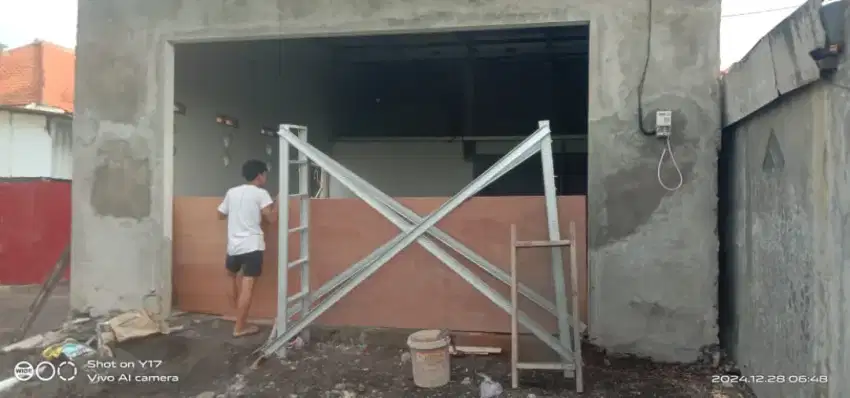 Spesialis pintu harmonika