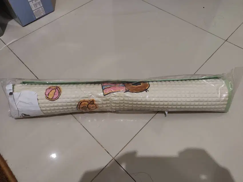 Perlak khusus bayi bergambar.