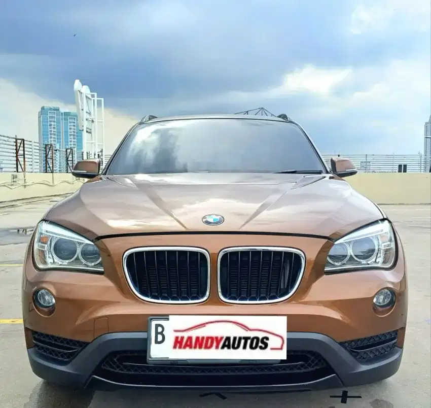 BMW X1 Diesel Panoramik Tahun 2013 Automatic Coklat Metalik