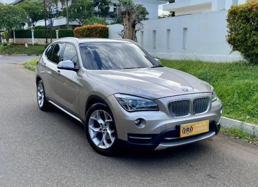 DIJUAL BMW X1 SDRIVE 1.8I TAHUN 2013 WARNA COKLAT MUDA METALIK