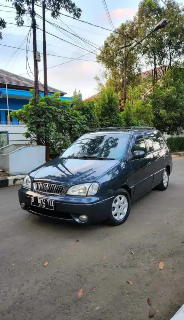 KIA Carens th 2003 Metik mulus terawat bisa tuker tambah motor