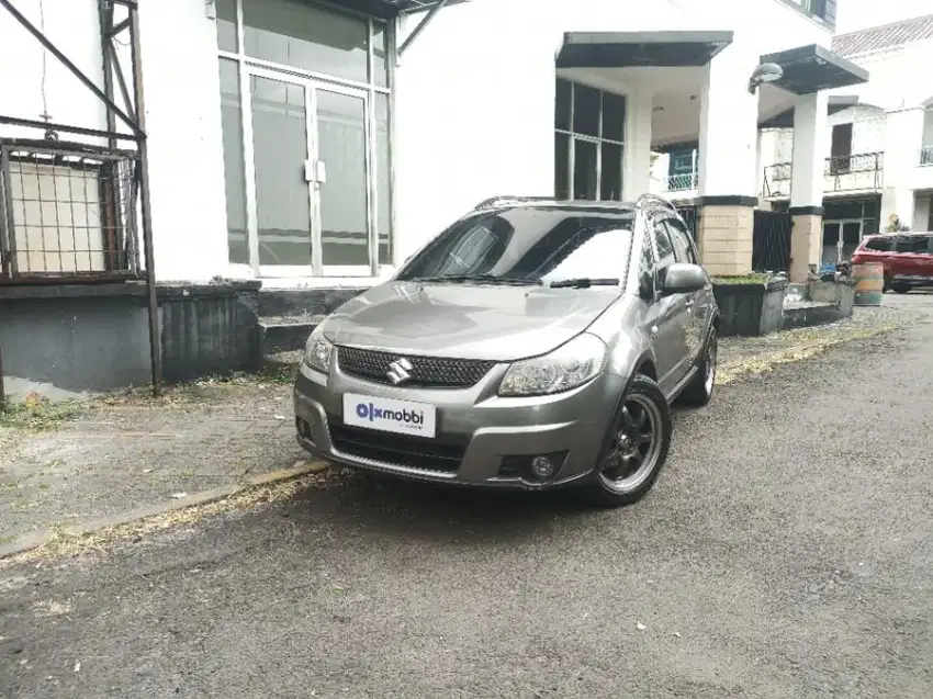 DP Rendah - SUZUKI SX4 1.5 X-OVER BENSIN M/T 2011 ABU