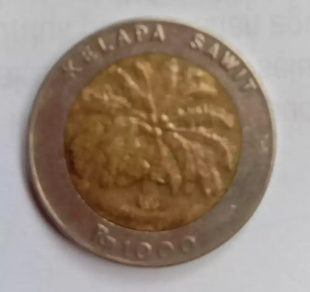 Uang coin antik pecahan Rp 1000 kelapa sawit seri th 1996