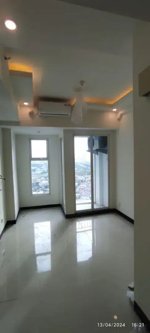 Sewa apartemen Amor kosongan baru gress di atas mall Pakuwon City