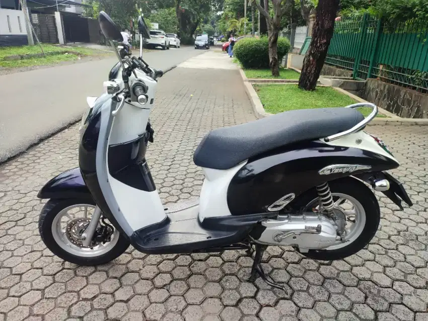 Scoopy karbu rawatan mulus