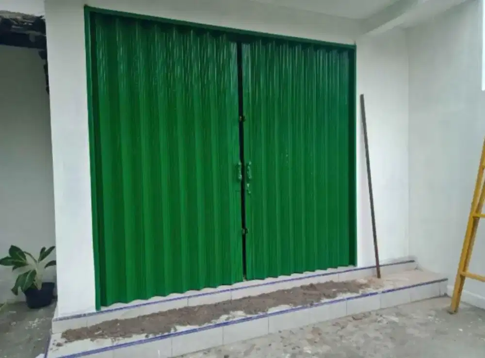 Folding gate rolling door