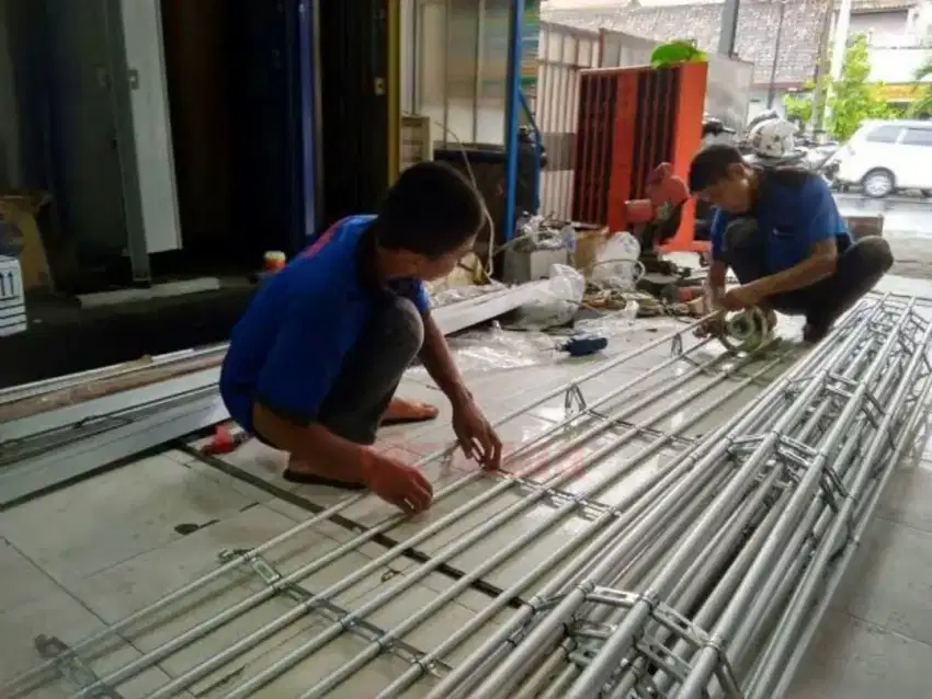 Kreasi mandiri terima bongkar,pasang,service,rolling door,folding gate