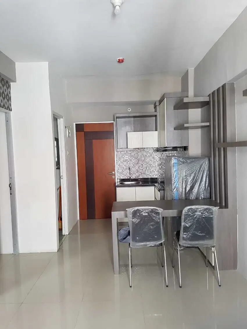 Apartement dengan 2 kamar tidur dan sky garden