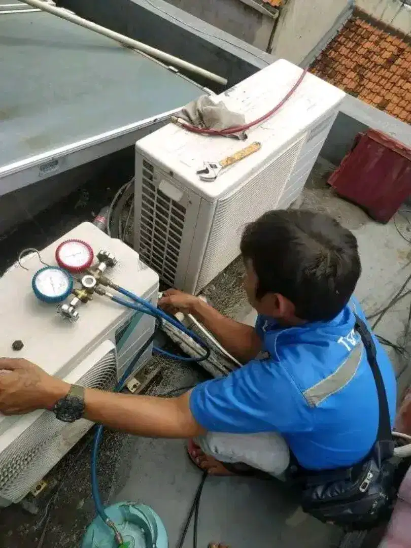 SERVICE AC BONGKAR PASANG AC