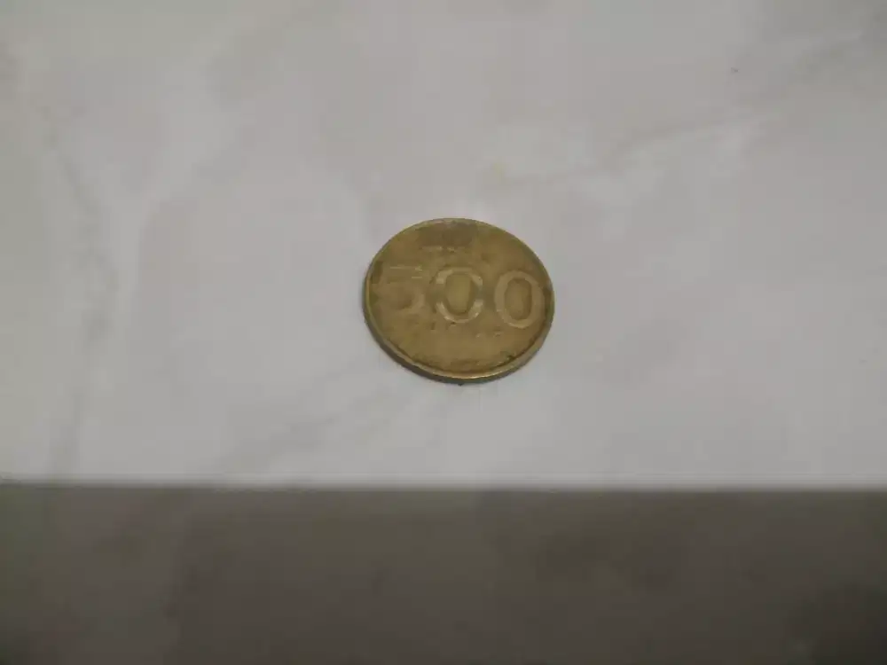 Uang coin 500 rph melati