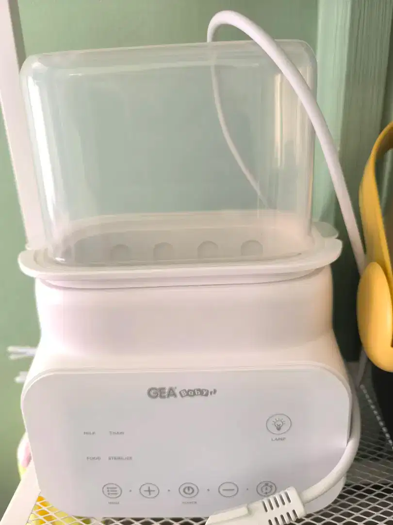 Gea steril botol dan pemanas asi