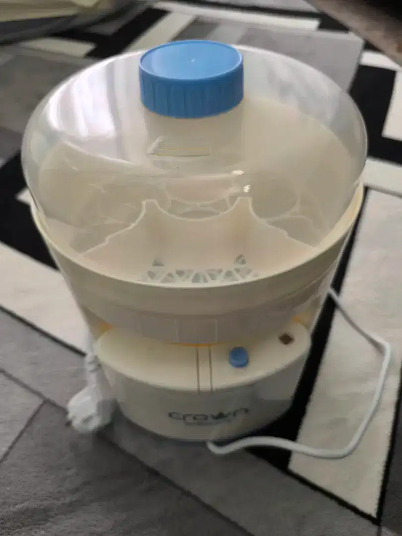Crown steril botol susu