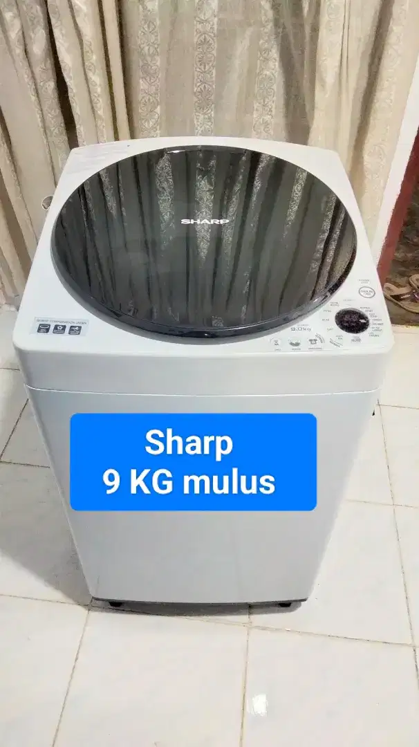 Sharp automatic masih mulus banget 9 kg kk