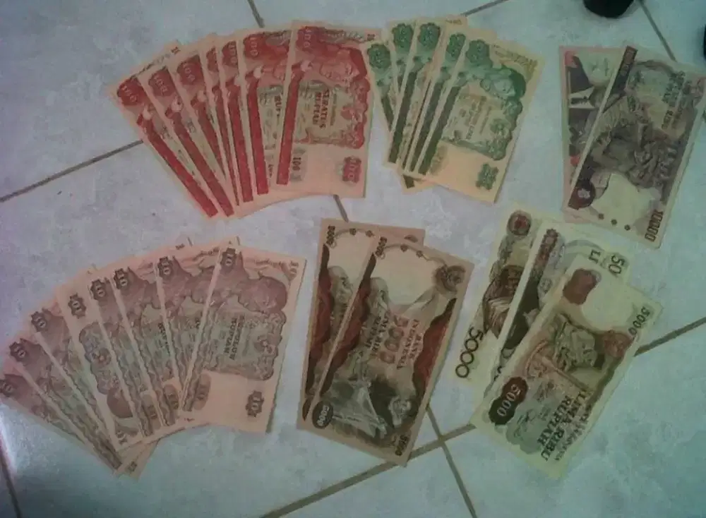 Uang lama campur mulus