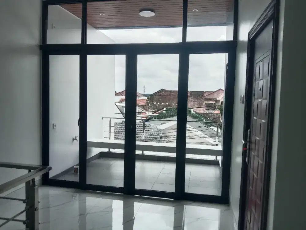 Pemasangan aluminium pintu dan jendela